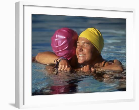 Female Swimmers Reacts to Victory-null-Framed Photographic Print