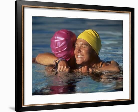 Female Swimmers Reacts to Victory-null-Framed Photographic Print