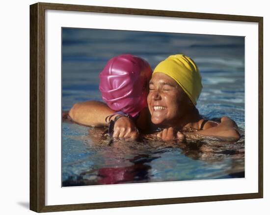 Female Swimmers Reacts to Victory-null-Framed Photographic Print