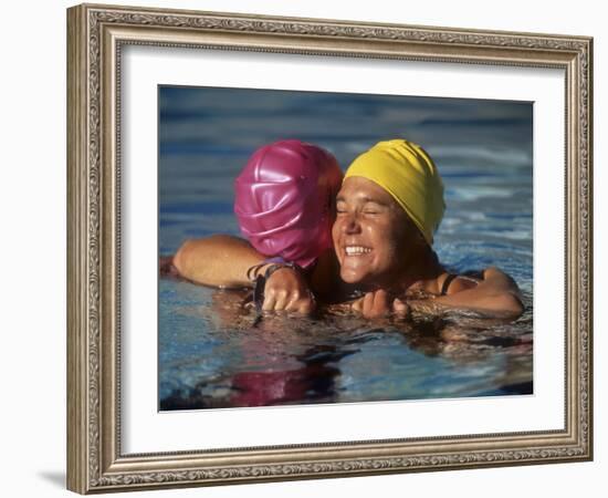 Female Swimmers Reacts to Victory-null-Framed Photographic Print