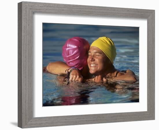 Female Swimmers Reacts to Victory-null-Framed Photographic Print