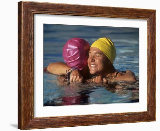 Female Swimmers Reacts to Victory-null-Framed Photographic Print