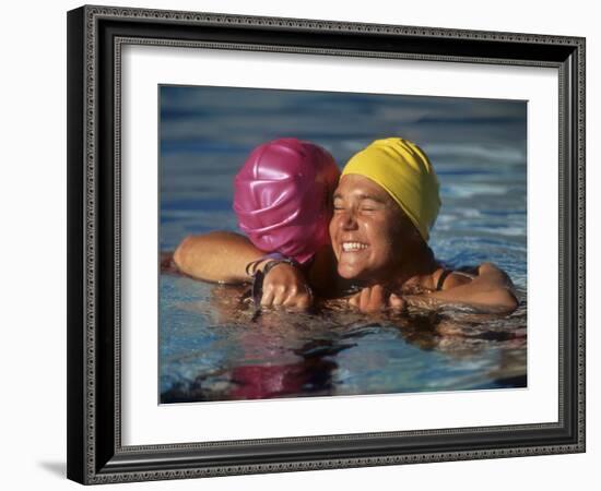 Female Swimmers Reacts to Victory-null-Framed Photographic Print