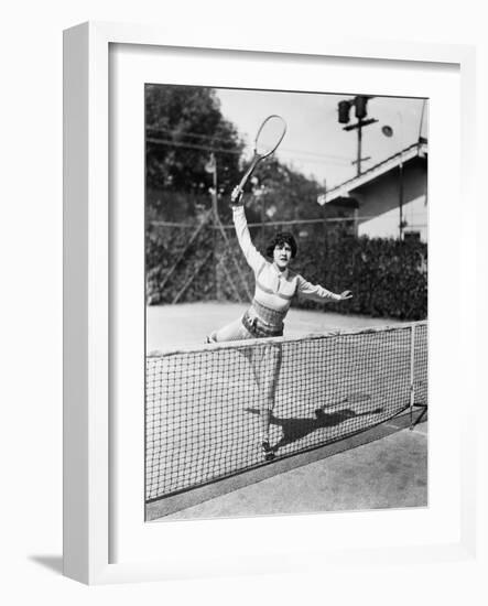 Female Tennis Player Reaching for Shot-null-Framed Photo