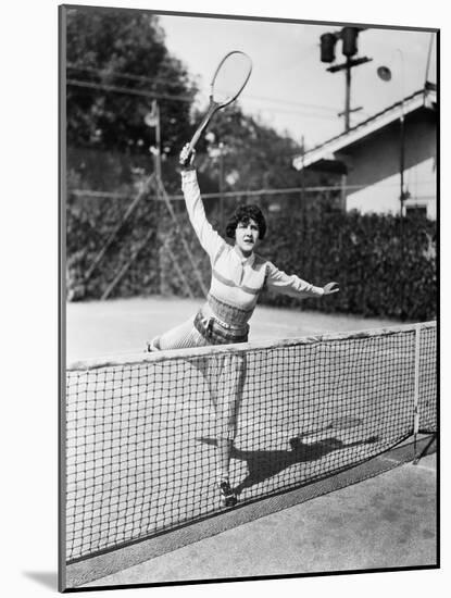 Female Tennis Player Reaching for Shot-null-Mounted Photo