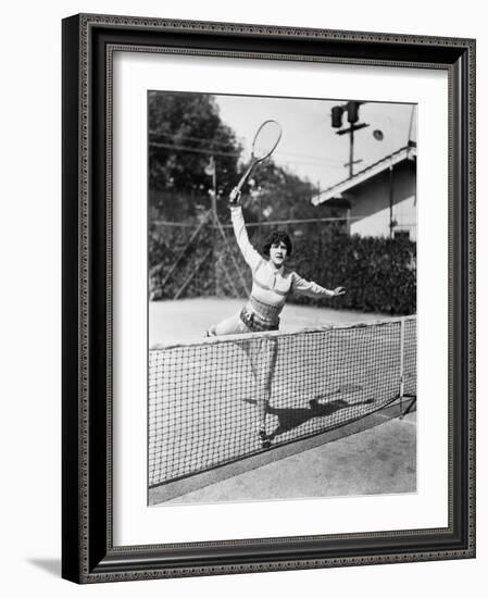 Female Tennis Player Reaching for Shot-null-Framed Photo