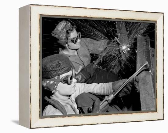 Female Welders at Work in a Steel Mill, Replacing Men Called to Duty During World War II-Margaret Bourke-White-Framed Premier Image Canvas