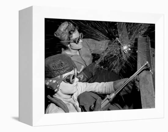 Female Welders at Work in a Steel Mill, Replacing Men Called to Duty During World War II-Margaret Bourke-White-Framed Premier Image Canvas