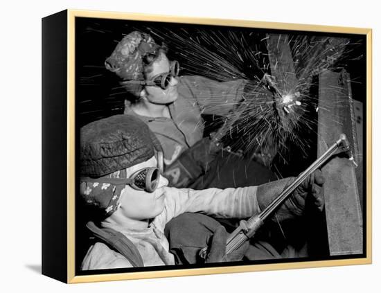 Female Welders at Work in a Steel Mill, Replacing Men Called to Duty During World War II-Margaret Bourke-White-Framed Premier Image Canvas