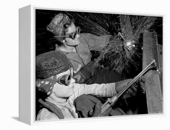 Female Welders at Work in a Steel Mill, Replacing Men Called to Duty During World War II-Margaret Bourke-White-Framed Premier Image Canvas