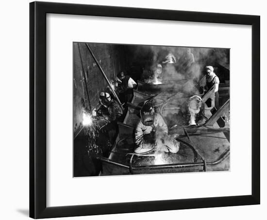 Female Welders Welding Seams on Deck Section of an Aircraft Carrier under Construction at Shipyard-Margaret Bourke-White-Framed Photographic Print