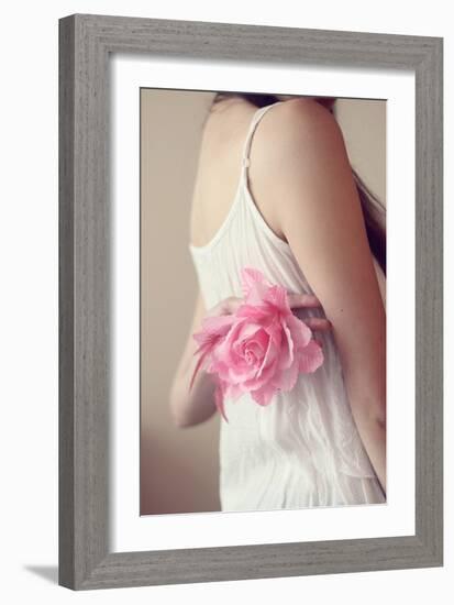 Female Youth Holding Pink Flower-Carolina Hernández-Framed Photographic Print