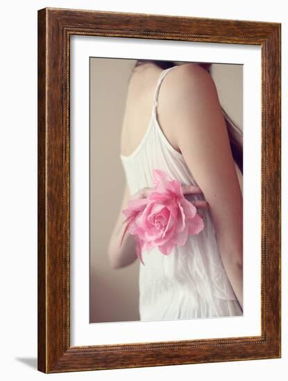 Female Youth Holding Pink Flower-Carolina Hernández-Framed Photographic Print