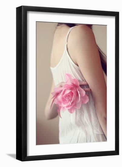 Female Youth Holding Pink Flower-Carolina Hernández-Framed Photographic Print