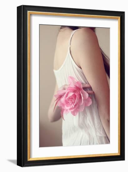 Female Youth Holding Pink Flower-Carolina Hernández-Framed Photographic Print