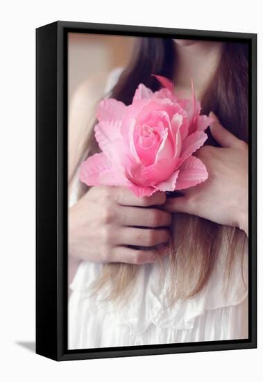 Female Youth Holding Pretend Flower-Carolina Hernández-Framed Premier Image Canvas