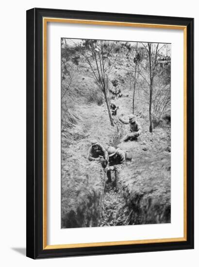 Fench Sappers in Gas Masks Re-Laying Telephone Lines after a Bombardment, 1918-null-Framed Giclee Print