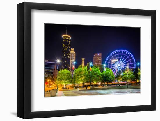 Ferris Wheel and Buildings Seen from Olympic Centennial Park at Night in Atlanta, Georgia.-Jon Bilous-Framed Photographic Print