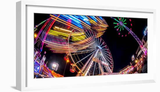 Ferris Wheel and various other funfair rides at night at Nottingham's Goose Fair, Nottingham, Notti-Frank Fell-Framed Photographic Print