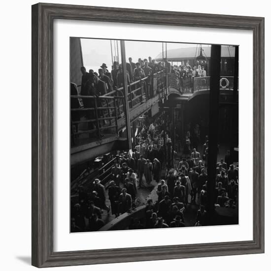 Ferry Boat Commuters from Staten Island Disembarking at Ferry Slip in Manhattan-Andreas Feininger-Framed Photographic Print