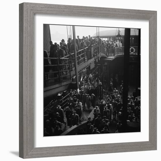 Ferry Boat Commuters from Staten Island Disembarking at Ferry Slip in Manhattan-Andreas Feininger-Framed Photographic Print