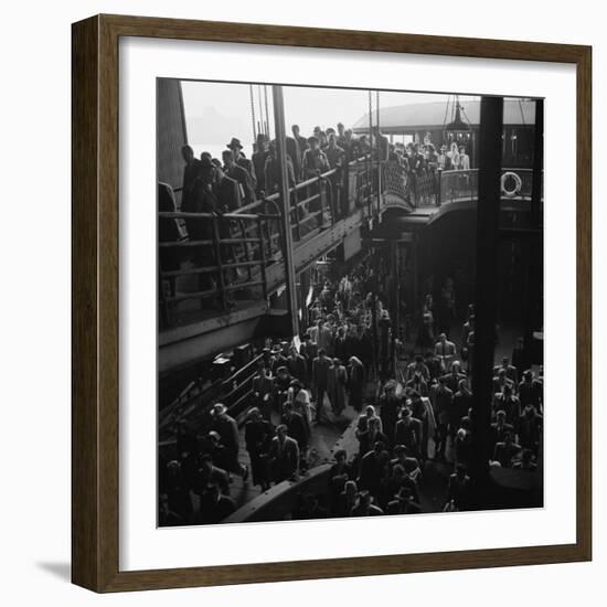 Ferry Boat Commuters from Staten Island Disembarking at Ferry Slip in Manhattan-Andreas Feininger-Framed Photographic Print