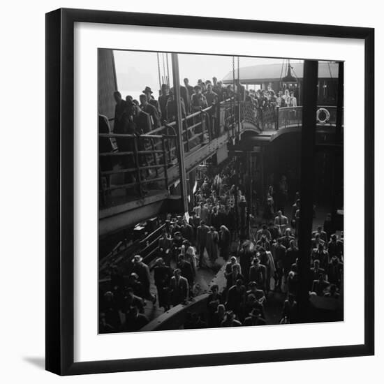 Ferry Boat Commuters from Staten Island Disembarking at Ferry Slip in Manhattan-Andreas Feininger-Framed Photographic Print