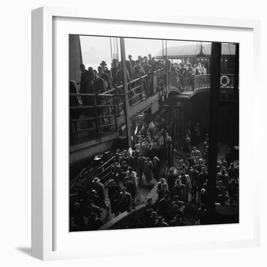 Ferry Boat Commuters from Staten Island Disembarking at Ferry Slip in Manhattan-Andreas Feininger-Framed Photographic Print