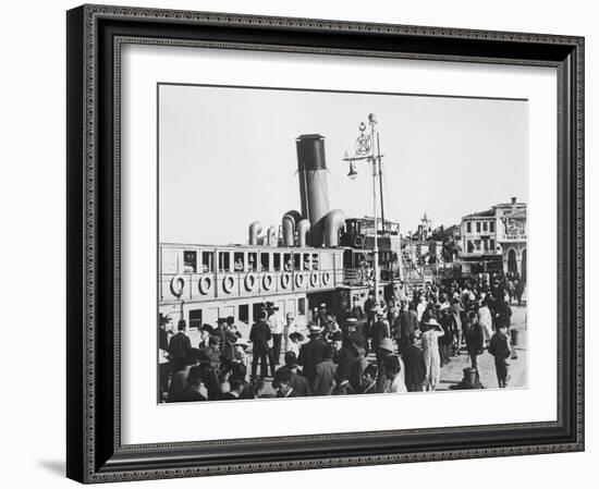 Ferry lands passengers on the island of Prinkipo off the coast of Istanbul, c.1920-null-Framed Photographic Print
