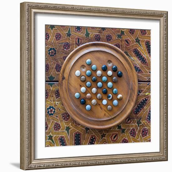 Fes, Morocco. Wooden game of marbles.-Julien McRoberts-Framed Photographic Print