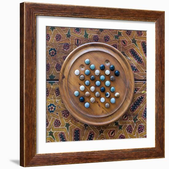 Fes, Morocco. Wooden game of marbles.-Julien McRoberts-Framed Photographic Print