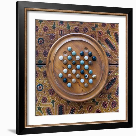 Fes, Morocco. Wooden game of marbles.-Julien McRoberts-Framed Photographic Print