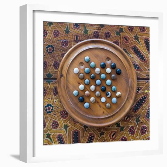 Fes, Morocco. Wooden game of marbles.-Julien McRoberts-Framed Photographic Print