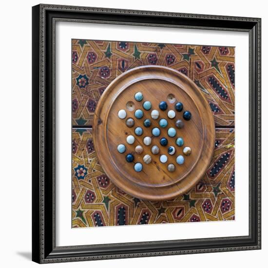 Fes, Morocco. Wooden game of marbles.-Julien McRoberts-Framed Photographic Print