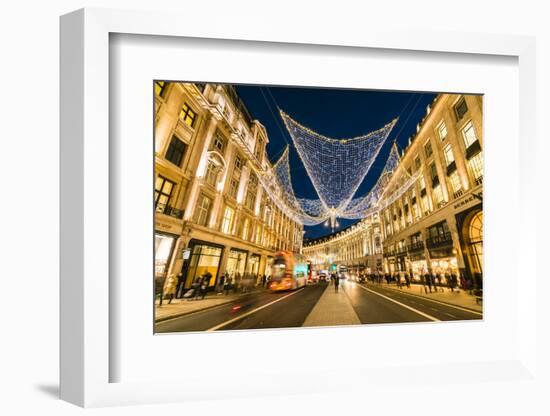 Festive Christmas lights in Regent Street in 2016, London, England, United Kingdom, Europe-Fraser Hall-Framed Photographic Print