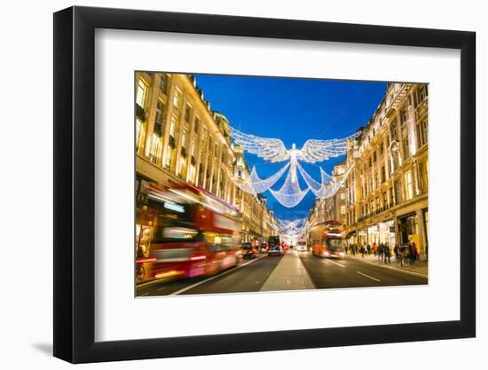 Festive Christmas lights in Regent Street in 2016, London, England, United Kingdom, Europe-Fraser Hall-Framed Photographic Print