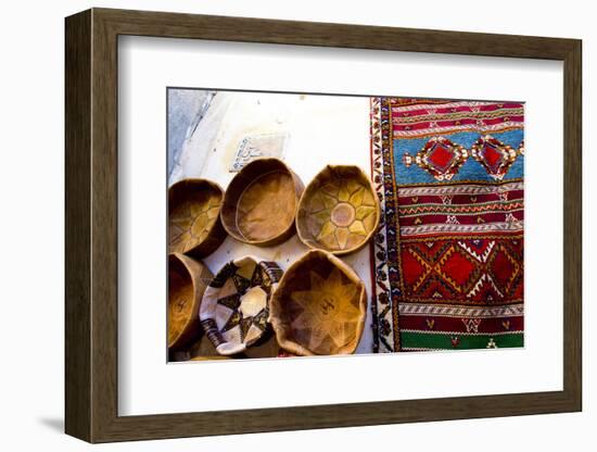 Fez Morocco leather baskets & oriental carpet on the wall in the old medina-Ellen Clark-Framed Photographic Print