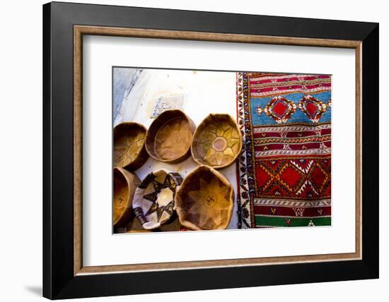 Fez Morocco leather baskets & oriental carpet on the wall in the old medina-Ellen Clark-Framed Photographic Print