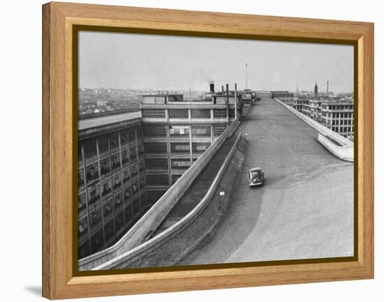 Fiat Car Driving Along the Desolate Street-Carl Mydans-Framed Premier Image Canvas