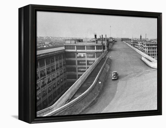 Fiat Car Driving Along the Desolate Street-Carl Mydans-Framed Premier Image Canvas