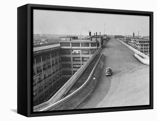 Fiat Car Driving Along the Desolate Street-Carl Mydans-Framed Premier Image Canvas