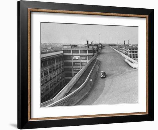 Fiat Car Driving Along the Desolate Street-Carl Mydans-Framed Photographic Print