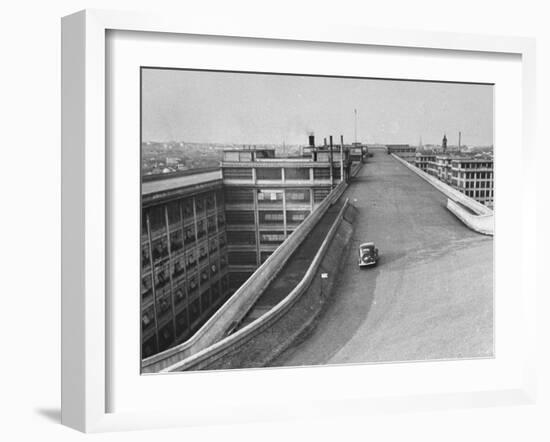 Fiat Car Driving Along the Desolate Street-Carl Mydans-Framed Photographic Print