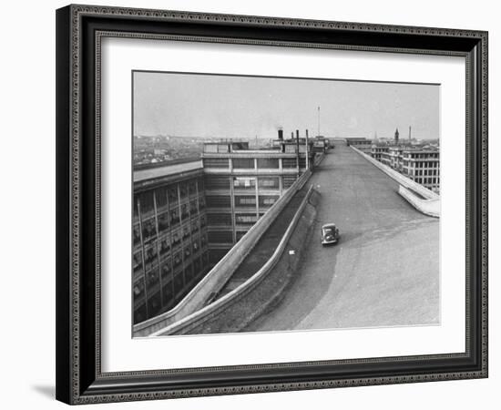 Fiat Car Driving Along the Desolate Street-Carl Mydans-Framed Photographic Print