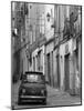 Fiat Driving in Narrow Street, Sassari, Sardinia, Italy-Doug Pearson-Mounted Photographic Print