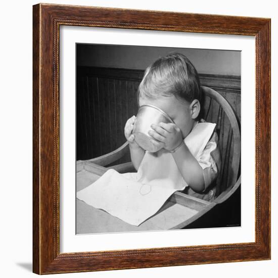 Fifteen Mo. Old Baby Demonstrates How He Can Now Drink from a Cup Even Though It is a Bit Sloppy-Nina Leen-Framed Photographic Print