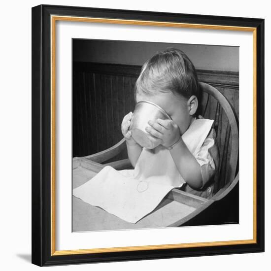 Fifteen Mo. Old Baby Demonstrates How He Can Now Drink from a Cup Even Though It is a Bit Sloppy-Nina Leen-Framed Photographic Print