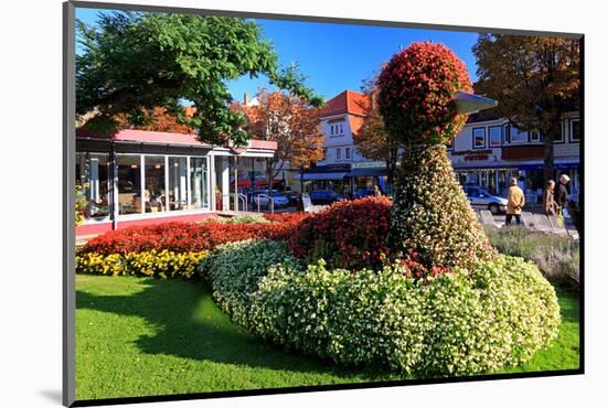 Figure made of Flowers on Bummelallee Alley, Bad Harzburg, Germany-null-Mounted Art Print