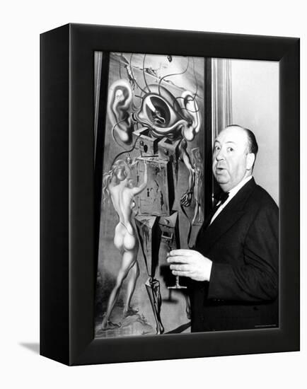 Film Director Alfred Hitchcock, Standing Beside Salvador Dali's Painting "Movies"-Herbert Gehr-Framed Premier Image Canvas