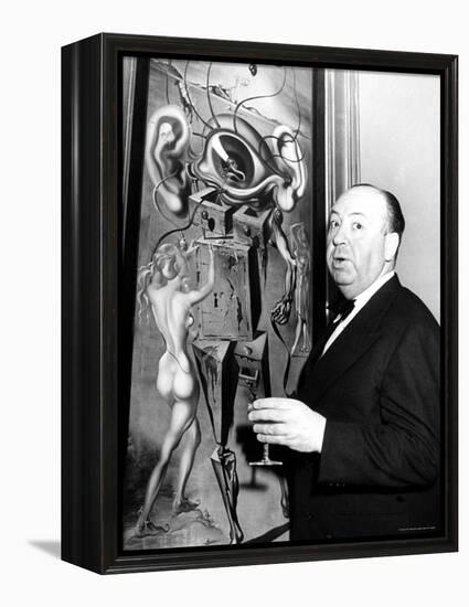 Film Director Alfred Hitchcock, Standing Beside Salvador Dali's Painting "Movies"-Herbert Gehr-Framed Premier Image Canvas